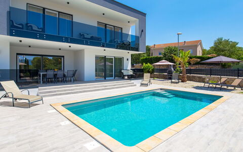 Villa Palma: Water, Building, Sky, Swimming Pool, Plant, Azure, Shade, Interior Design, Tree, Condominium