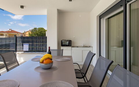 Villa Palma: Table, Furniture, Property, Chair, Building, Dishware, Tableware, Living Room, Interior Design, Orange