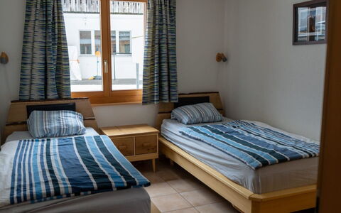 Alpine Retreat: Furniture, Wood, Interior Design, Textile, Floor, Bed, Flooring, Lighting, Room, Bedroom