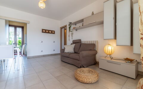 Casamare: Furniture, Couch, Picture Frame, Comfort, Wood, House, Lighting, Living Room, Interior Design, Flooring