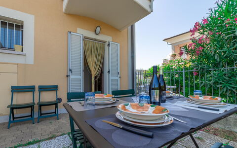 Casamare: Table, Furniture, Property, Window, Plant, Tableware, Chair, Blue, Azure, Building