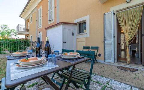 Casamare: Table, Furniture, Building, Property, Plant, Window, Tableware, Flowerpot, Azure, Door
