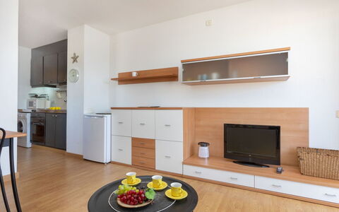 Del Sol: Cabinetry, Furniture, Property, Building, Wood, Kitchen, Lighting, Orange, Table, Flooring