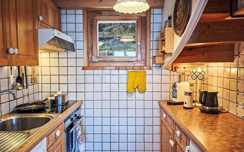 Cheechako: Kitchen, Wood, Countertop, Kitchen Appliance, Interior Design, Major Appliance, Plumbing Fixture, Cabinetry, Sink, Tap