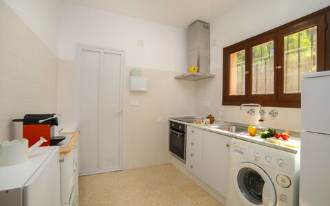 Marisol Park: Laundry Room, Cabinetry, Property, Washing Machine, Clothes Dryer, Furniture, Window, Building, Kitchen, Kitchen Stove
