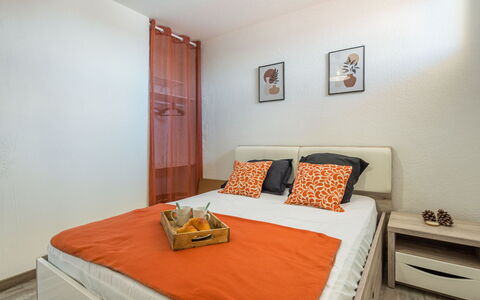 Babel: Furniture, Property, Comfort, Wood, Orange, Pillow, Interior Design, Table, Bed Frame, Floor