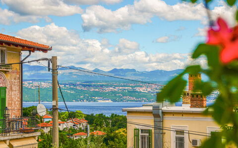 Lovran 122: Cloud, Sky, Water, Building, Property, Azure, Window, Mountain, Body Of Water, Lake