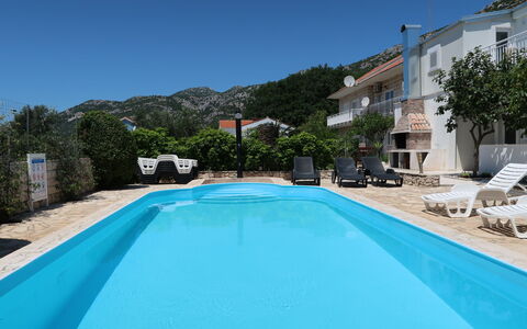 Kevin: Water, Sky, Plant, Building, Azure, Natural Landscape, Tree, Body Of Water, Beach, Terrain