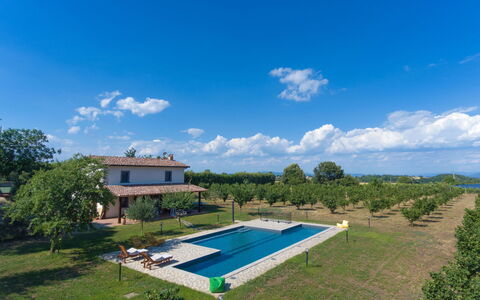 Pescatori: Water, Sky, Plant, Building, Azure, Natural Landscape, Tree, Body Of Water, Beach, Terrain