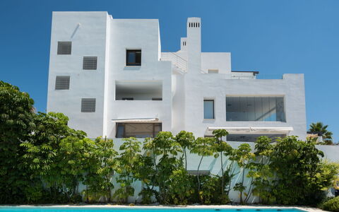 Cortesin: Water, Sky, Plant, Property, Building, Window, Blue, Azure, Tree, Rectangle