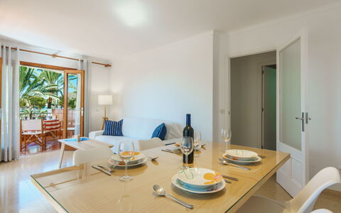 Can Llorenc Sea Views: Table, Furniture, Property, Chair, Tableware, Building, Wood, Interior Design, Lighting, Kitchen & Dining Room Table
