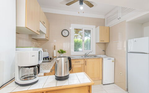 Flamicell: Cabinetry, Countertop, Furniture, Building, Property, Home Appliance, Kitchen Appliance, Kitchen, Ceiling Fan, Kitchen Stove