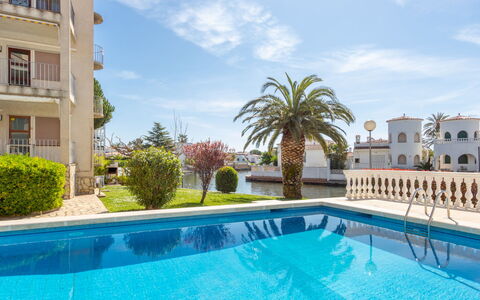 Flamicell: Water, Plant, Cloud, Sky, Building, Property, Swimming Pool, Blue, Azure, Window