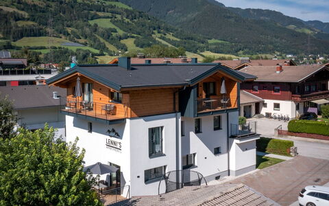 Bruck 420: Building, Sky, Property, Window, Cloud, Mountain, House, Tree, Vehicle, Plant