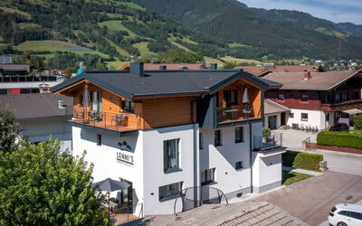 Bruck 420: Building, Sky, Property, Window, Cloud, Mountain, House, Tree, Vehicle, Plant