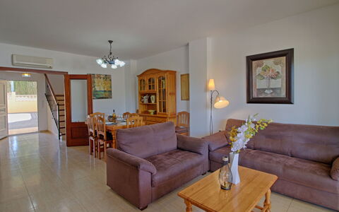 Bajamar: Plant, Furniture, Property, Window, Chair, Building, Wood, Lighting, Flowerpot, Architecture