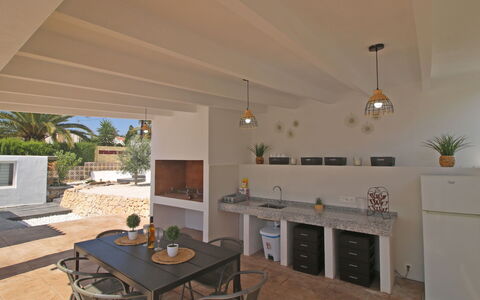 Claudia: Plant, Furniture, Property, Window, Chair, Building, Wood, Lighting, Flowerpot, Architecture