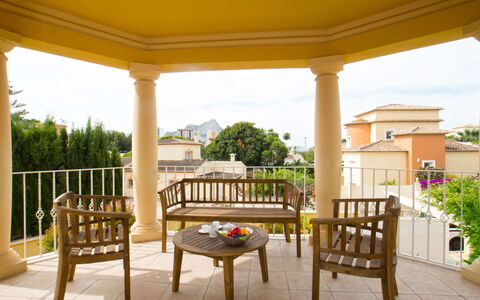 Villa Acuario: Plant, Furniture, Property, Window, Chair, Building, Wood, Lighting, Flowerpot, Architecture