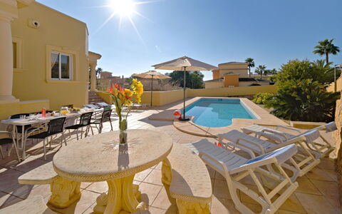 Villa Acuario: Sky, Building, Window, Chair, Shade, House, Outdoor Furniture, Interior Design, Urban Design, Table