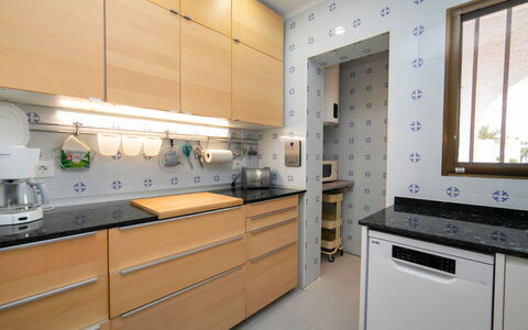 Villa Panorama: Countertop, Cabinetry, Property, Building, Kitchen Appliance, Window, Kitchen, Kitchen Stove, Wood, Interior Design