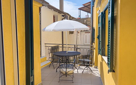 La Casetta Di Emma - Villa Faraldi: Table, Furniture, Property, Building, Umbrella, Chair, Sky, Shade, Wood, Outdoor Table