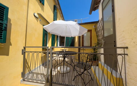 La Casetta Di Emma - Villa Faraldi: Daytime, Building, Window, Sky, Blue, Wood, Shade, Yellow, House, Residential Area