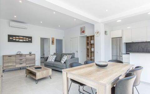 Gironés: Table, Furniture, Couch, Property, Picture Frame, Comfort, Interior Design, Lighting, Flooring, Architecture