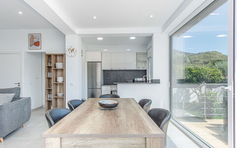 Gironés: Table, Furniture, Property, Plant, Couch, Cabinetry, Building, Chair, Wood, Lighting