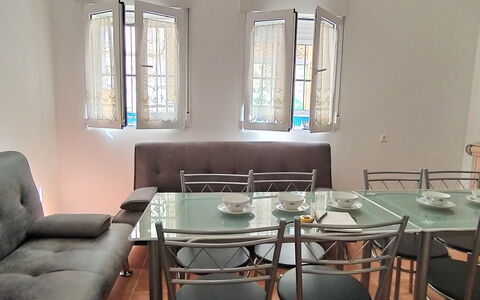 Rainbow: Table, Furniture, Property, Window, Chair, Couch, Lighting, Interior Design, Flooring