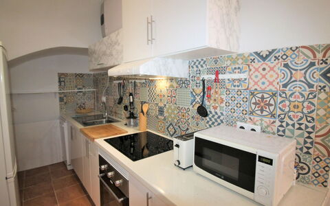 Rainbow: Cabinetry, Property, Furniture, Countertop, Kitchen Stove, Sink, Kitchen, Interior Design, Lighting, Kitchen Appliance