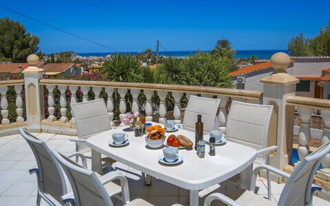 Villa Polonia Mouche: Table, Tableware, Furniture, Sky, Property, Building, Chair, Outdoor Table, Azure, Outdoor Furniture