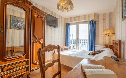 Le Surcouf: Furniture, Property, Table, Building, Wood, Architecture, Chair, Yellow, Curtain, Comfort