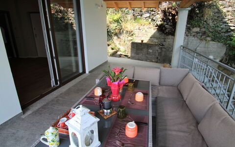 Lucina: Plant, Table, Furniture, Property, Couch, Building, Interior Design, House, Architecture, Tableware