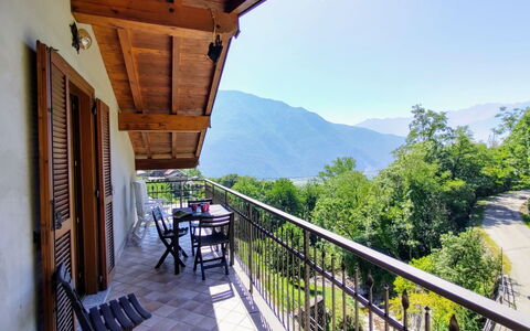 Sorico Albonico 684: Sky, Building, Property, Furniture, Plant, Porch, Wood, Mountain, Shade, Fence