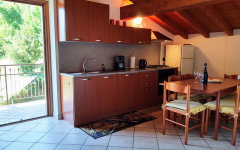 Sorico Albonico 684: Cabinetry, Furniture, Property, Table, Wood, Countertop, Interior Design, Flooring, Kitchen, Plant
