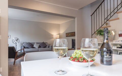 Casa Del Porto: Furniture, Table, Property, Tableware, Drinkware, Stemware, Interior Design, Wine Glass, Barware, Dishware