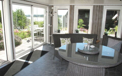 Stegeborg Sjöstugan: Plant, Table, Property, Furniture, Window, Interior Design, Lighting, Building, Architecture