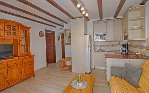 Damara V: Cabinetry, Furniture, Property, Table, Countertop, Building, Kitchen, Wood, Interior Design, Lighting