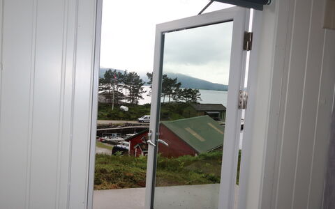 Sognesjö: Property, Plant, Sky, Door, Shade, Building, Wood, Window, Vehicle Door