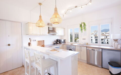 Puerto Banus Opq: Countertop, Cabinetry, Furniture, Kitchen, Table, Interior Design, Wood, Kitchen Stove, Kitchen Appliance