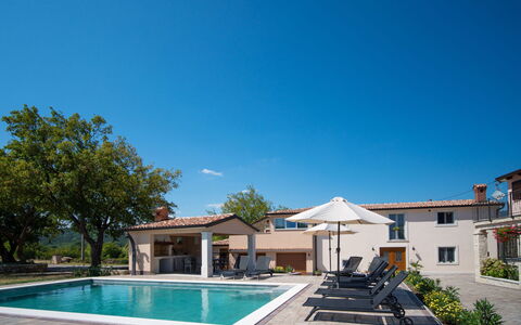Rika: Water, Plant, Sky, Property, Swimming Pool, Building, Shade, Tree, Window, Outdoor Furniture