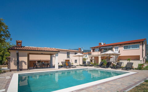 Rika: Water, Sky, Plant, Building, Property, Swimming Pool, Azure, Window, Chair, Rectangle