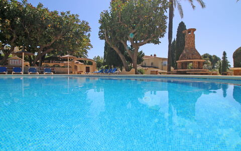 Las Cabañas: Water, Sky, Property, Swimming Pool, Plant, Azure, Tree, Vegetation, Leisure, Arecales