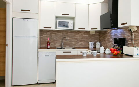 Calpe Calp 1117: Cabinetry, Property, Tap, Countertop, Sink, Kitchen Appliance, Wood, Kitchen, Interior Design, House