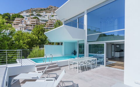 Kristina: Property, Sky, Building, Azure, Shade, Window, Outdoor Furniture, Architecture, Chair, Urban Design