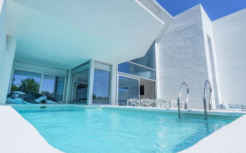 Kristina: Water, Azure, Building, Swimming Pool, Sky, Shade, Aqua, Condominium, Leisure, Composite Material