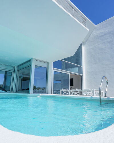 Kristina: Water, Azure, Building, Swimming Pool, Sky, Shade, Aqua, Condominium, Leisure, Composite Material