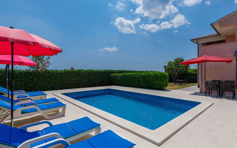 Goga: Cloud, Water, Plant, Sky, Furniture, Swimming Pool, Building, Azure, Outdoor Furniture, Shade