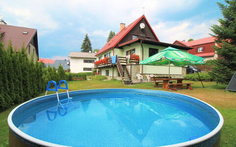 Harrachov Pool & Garden: Water, Cloud, Sky, Building, Daytime, Property, Plant, Azure, Nature, Swimming Pool