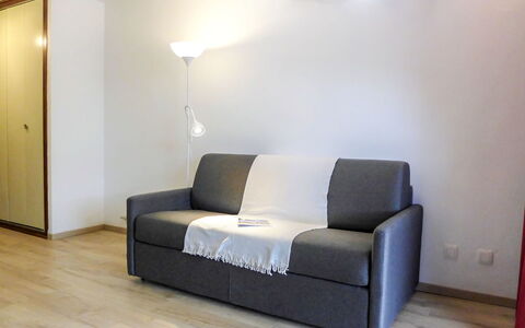 Le Pramouny: Furniture, Room, Couch, Property, Floor, Sofa Bed, Interior Design, Wall, Lighting, Living Room